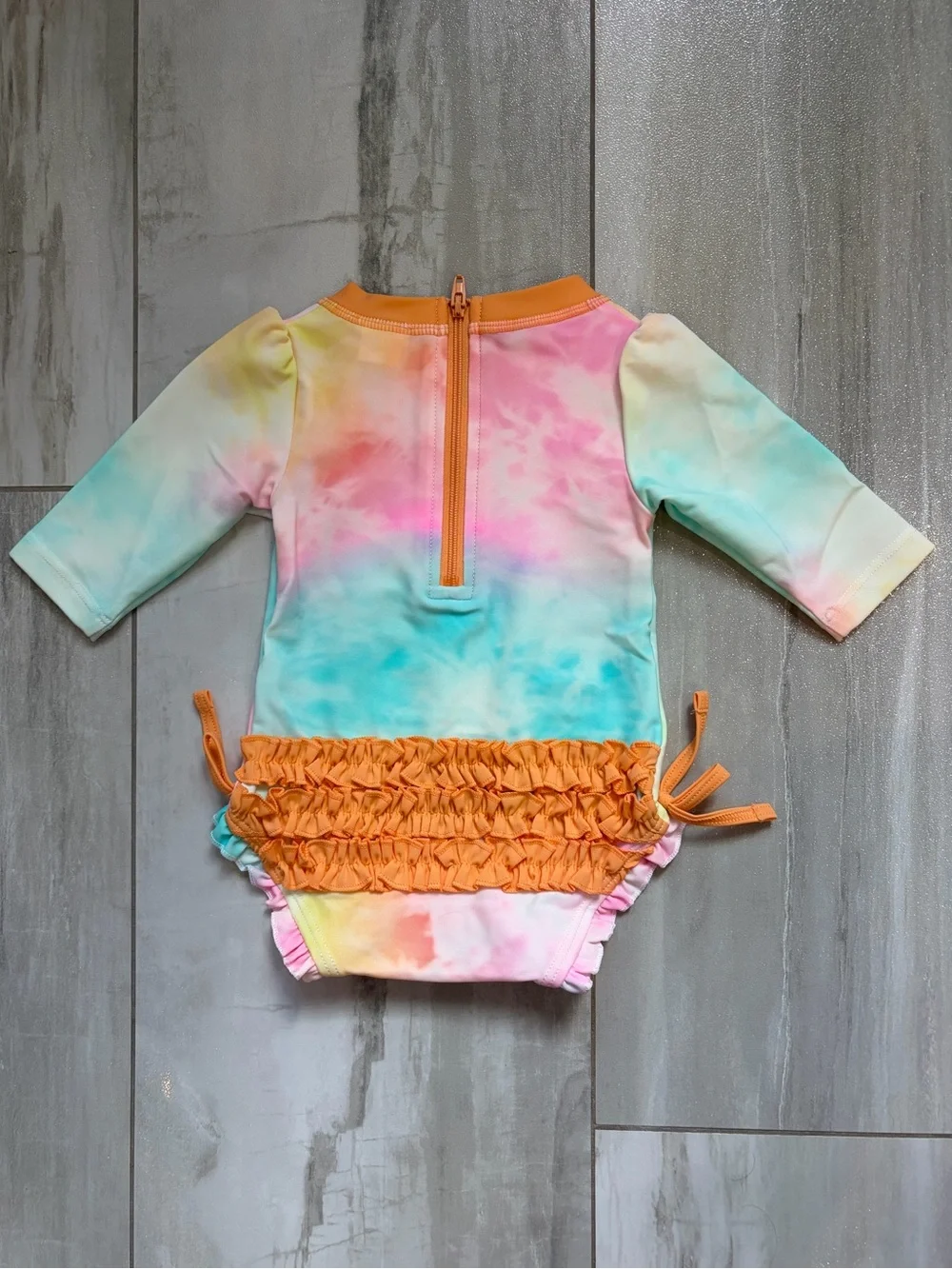 NWT RuffleButts Rainbow Tie Dye Long Sleeve Rash Guard One Piece Swimsuit, 0-3M